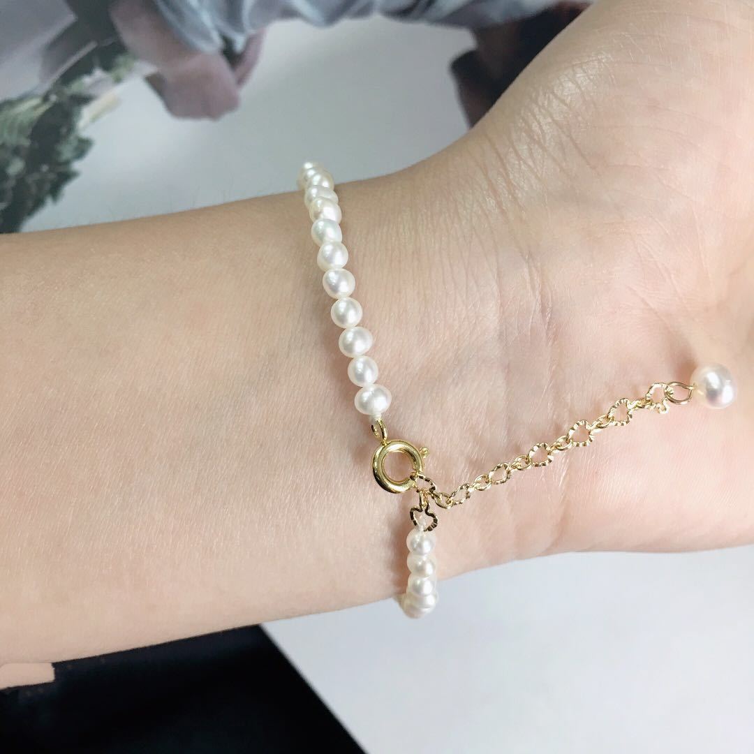 Delicate mini freshwater pearl bracelet with small white pearls