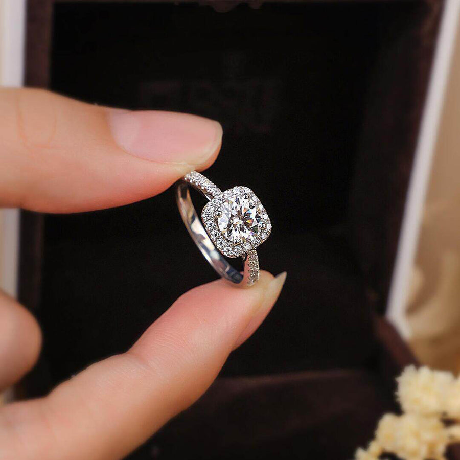 Cushion halo moissanite ring in polished sterling silver