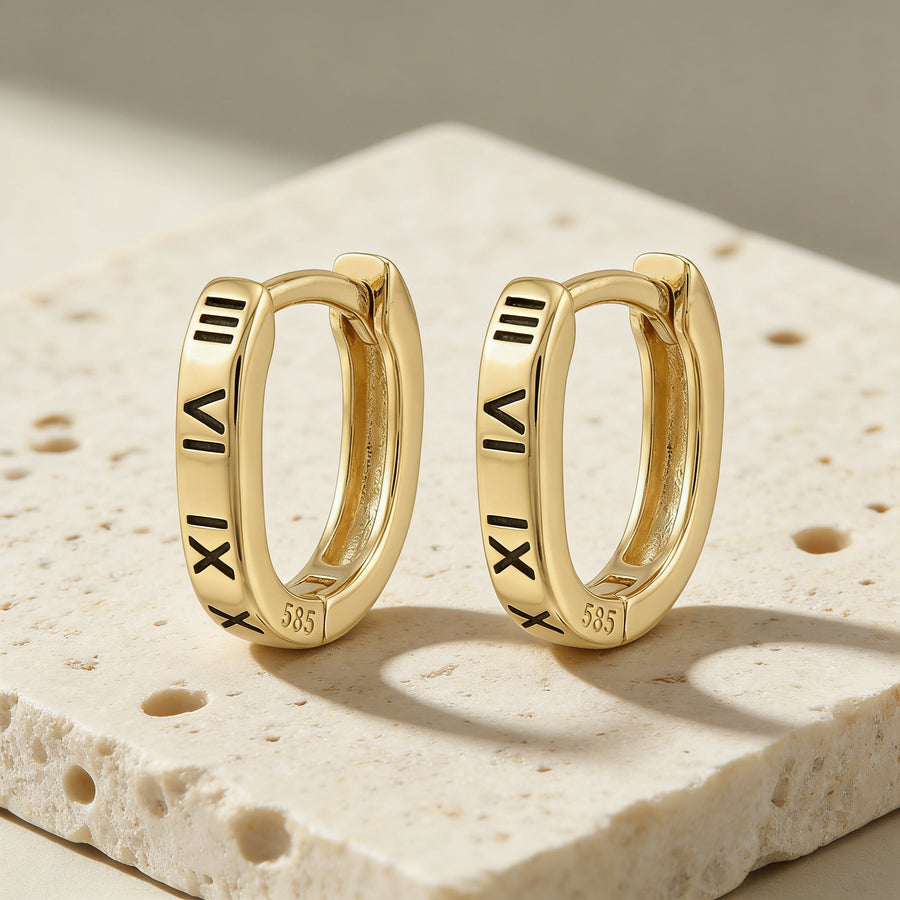 Roman numeral sterling silver oval huggie earrings